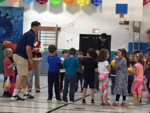 Teachers and kids in gym